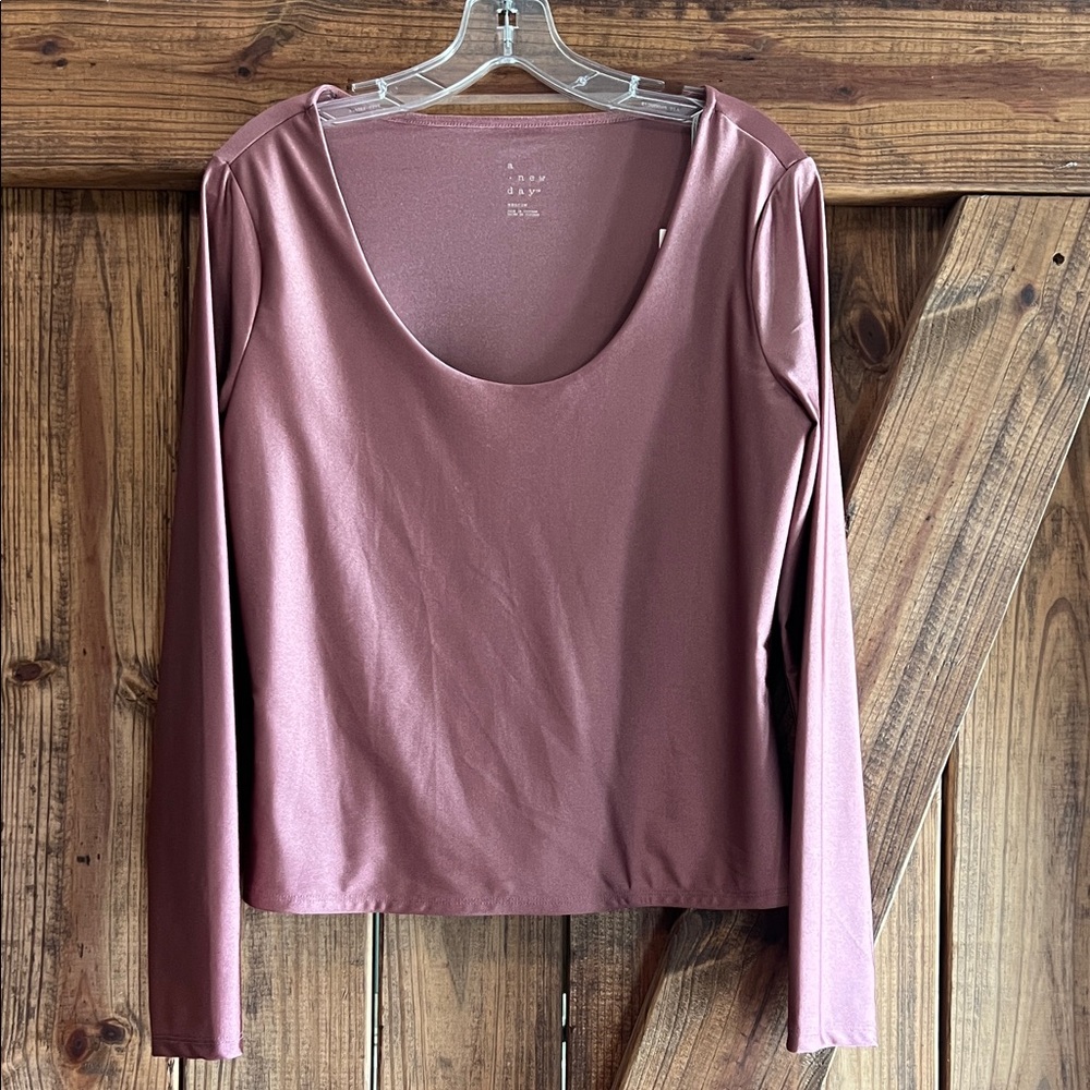 Long sleeved, mauve, fitted top